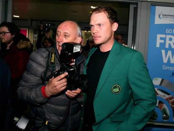 Masters champion Danny Willett arrives back in the UK. PICS: PA