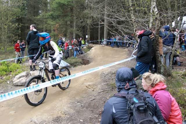 The 5th Peaty's Steel City downhill mountain bike race organised by Sheffield's World Champion, Steve Peat, took place at Hallifield Head Farm. Amber Charity in action on the course.