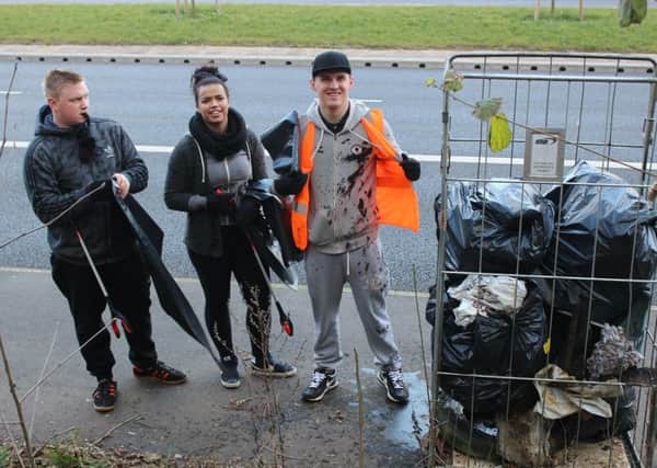 McDonald's staff give up their time to clear litter in Penistone Road, Sheffield. From left, Luke Gregory, Rhiannon Fryer and  Josh Hanney.
