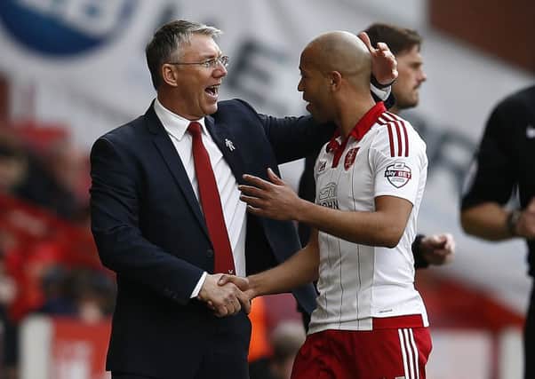 Nigel Adkins (left) says Alex Baptiste has been a key performer since arriving on loan 
Â©2016 Sport Image all rights reserved