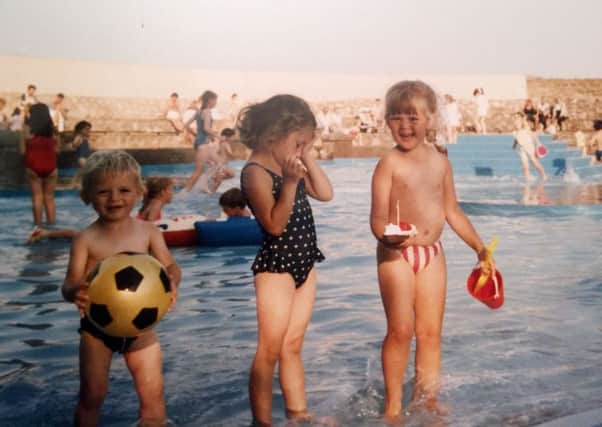 Amy Pullan (right) and my two cousins Sarah and Thomas Rose in the paddling pool at Cleethorpes