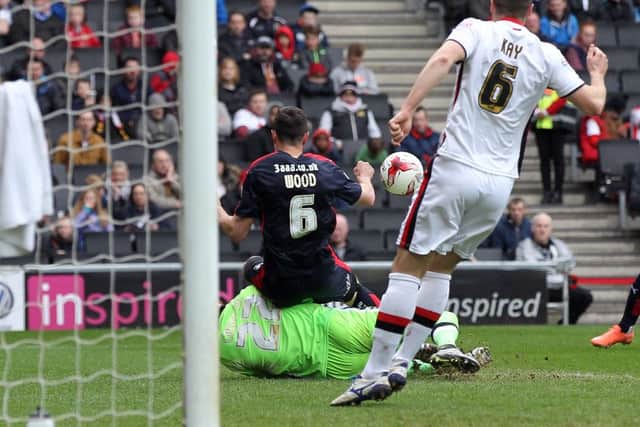 Woody wins a penalty against MK Dons