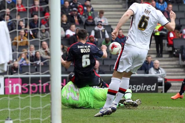 Woody wins a penalty at MK Dons