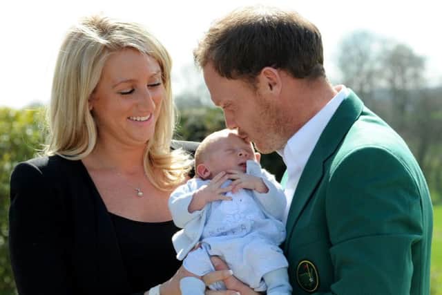 Masters champion Danny Willett with his wife Nicole and baby Zachariah at Lindrick Golf Club in South Yorkshire. Pic: PA