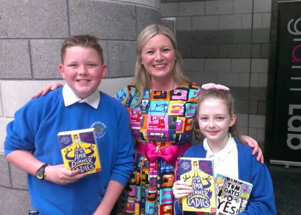 Children's author Pamela Butchart with Owston Park Primary pupils Jacob McLem, 11, and Calla Cox, 9.