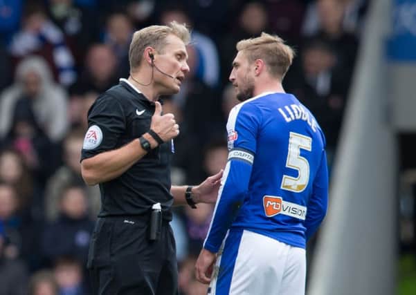 Chesterfield vs Sheffield United - Gary Liddle receives a talking to from Referee Graham Scott - Pic By James Williamson