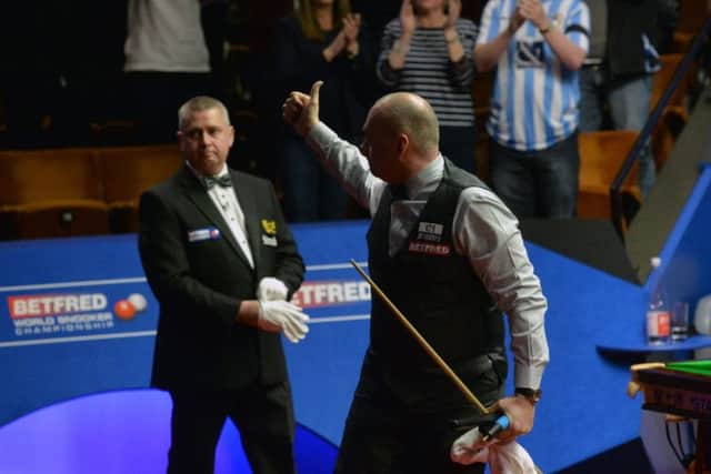 Stuart Bingham gives a thumbs up to the crowd after losing his first round match during day one of the Betfred Snooker World Championships at the Crucible Theatre, Sheffield. PRESS ASSOCIATION Photo