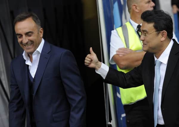 Happy start for Owls head coach Carlos Carvalhal and owner Dejhon Chansiri