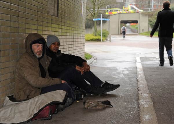 Anthony Cunningham, with John who is homeless, is hosting a Food Lovers charity event for the homeless people in Sheffield and supporting Mustard Seed, a charity that helps people in Jamaica. Picture: Andrew Roe
