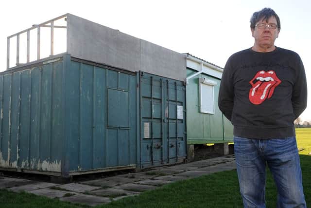 Adwick CC chairman John Muldowney infront of the clubs run down facilities as he is concerned about the clubs future . Picture: Andrew Roe