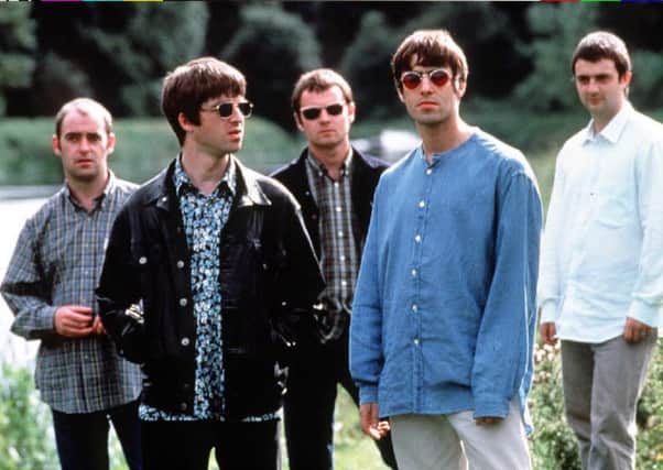 Oasis pictured in 1995. Photo by PA