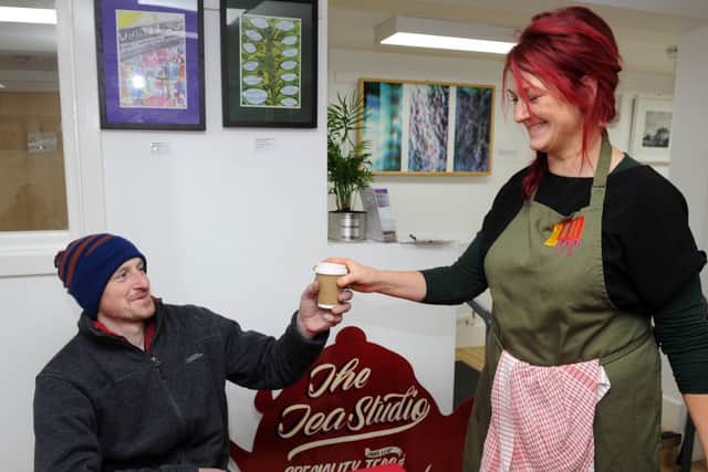 Jo Hardiman of The Tea Studio, at The Art House, Backfields, hands out of coffee to Nathan. Picture: Andrew Roe