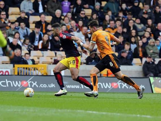 Leon Best in possession for the Millers at Wolves