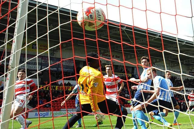 Tommy Rowe watches on with delight as his flick on ends up in the net. Photo: Howard Roe