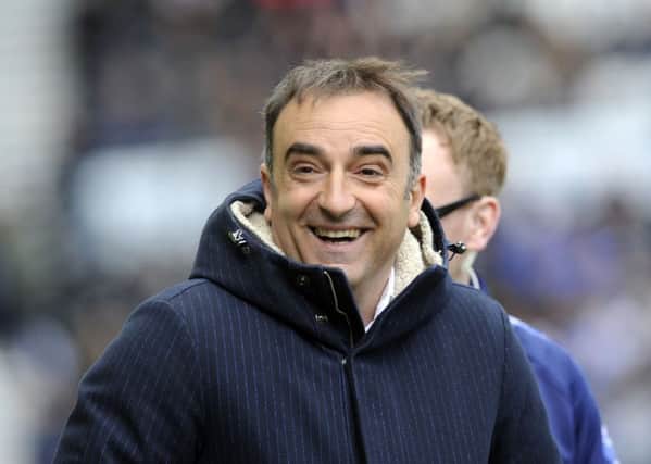 Owls head coach Carlos Carvalhal is all smiles during the 1-1 draw with Derby County