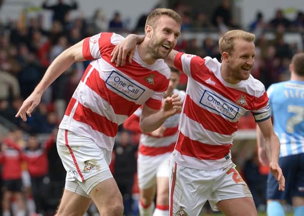 Rovers'  Andy Williams celebrates his goal with James Coppinger. Photo: Howard Roe