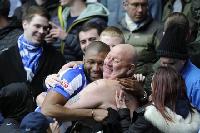 Owls old boy Reda Johnson in the crowd with Tango