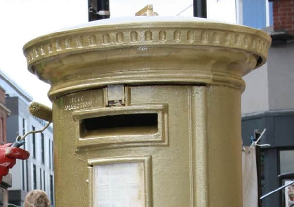 The Gold Postbox in Sheffield city centre