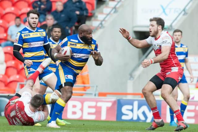 Makali Aizue breaks forward for the Dons against Barrow. Photo: Dean Atkins