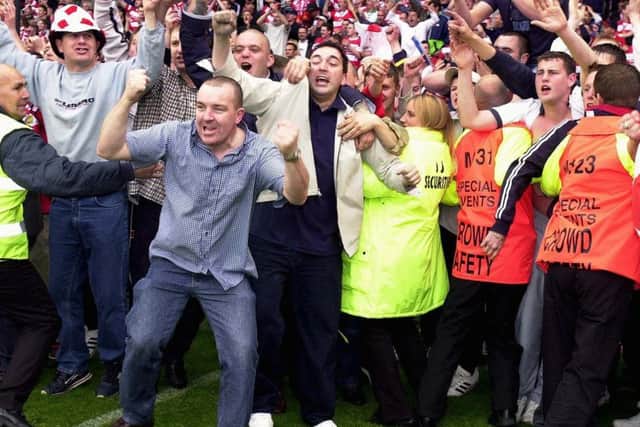Overjoyed fans celebrate Francis Tierney's golden goal which saw Doncaster Rovers return to the Football League.
