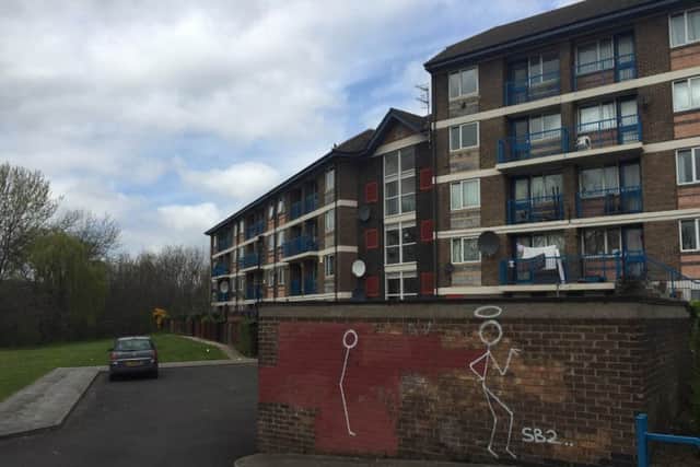 The block of flats which backs onto the woodland where drug users have been seen injecting drugs. Residents said that dealers use this car park to sell drug out of their window