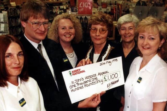 Then Doncaster Mayor Coun Yvonne Woodcock and Mark Toseland (trustee of St John's Hospice) collect a 1,000 cheque from BHS staff Angie Nicholson, Angie Taylor, Anne Fisher, Pat Henaghan and Linda Hall in 1998.