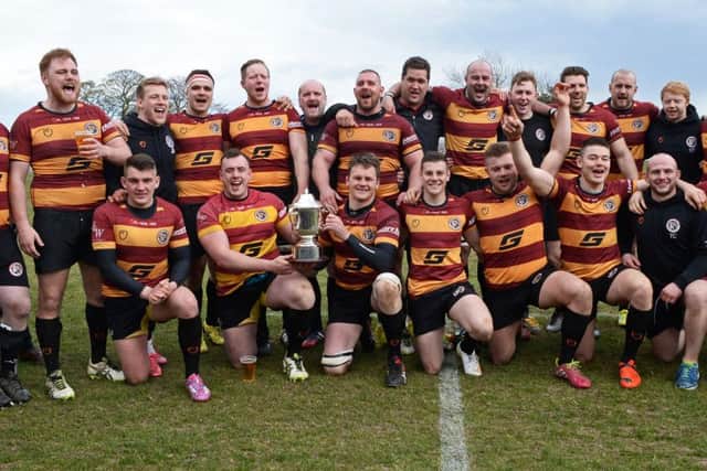 Sheffield Tigers RUFC pictured celebrating with the trophy after their match against llkley. Picture: Marie Caley
