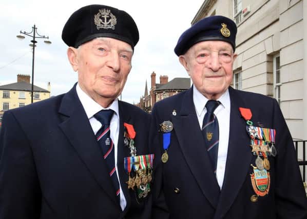 Two Rotherham veterans of World War II, Frank Alan Thorpe and Mr Gary Ardron, were presented with the Legion D'Honneur medal at Rotherham Town Hall by The Honorary Consul for France, Mr Jeremy Burton.