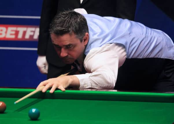 Alan McManus in action at the table. Photo: Chris Etchells
