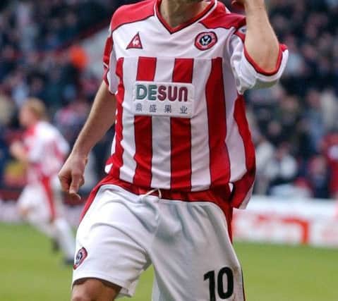 15 February 2004.Sheffield United v Colchester United, FA Cup 5th Round.Pictured Paul Peschisolido celebrates heading United into the Quarter Finals of the FA Cup with the only goal of the game.