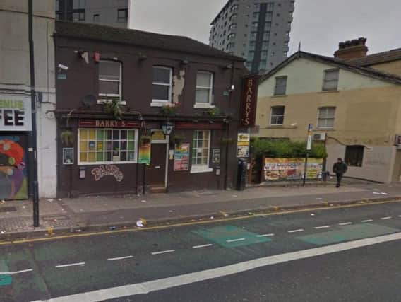 A 20-year-old woman sustained head injuries in an assault carried out outside Barry's Bar in London Road.