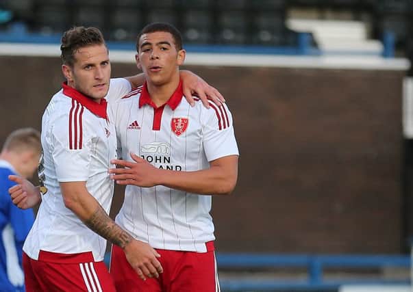 Che Adams celebrates his goal with Billy Sharp