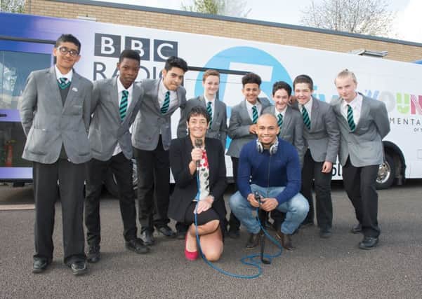Five live summariser Danny Webber with pupils at Parkwood Academy to encourage them to enter the junior sports comentator of the year competition
Picture Dean Atkins