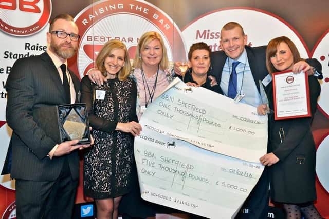 Sheffield night-time economy. Members of Sheffield's Best Bar None team pick up two national awards. From left, Nick Simmonite, Julie Hague, inspector Jayne Forrest, Tracey Ford, sgt Matt Burdett and Rachel Watson.