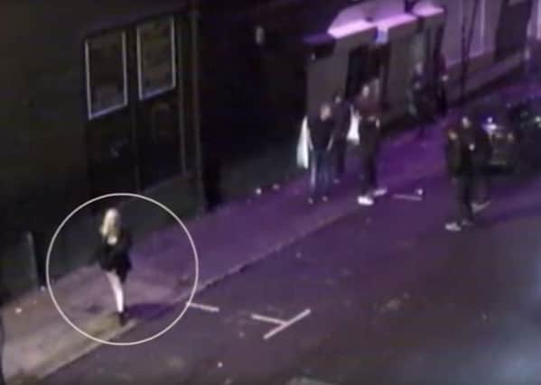 The woman police want to speak to after a man attacked another man with a bottle outside Corporation in Eldon Street, Sheffield. Photo: South Yorkshire Police