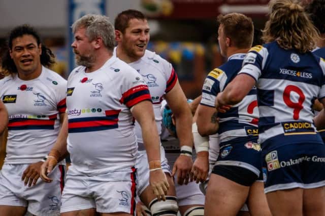 Knights club captain Matt Challinor (third from left) enjoys last weekends win. Photo: John Ashton