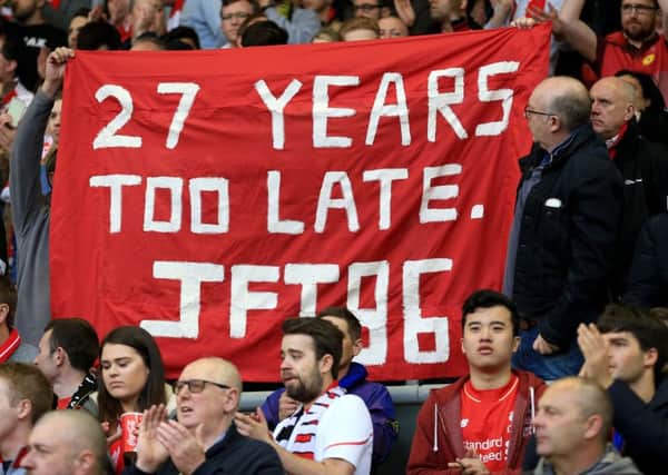 Liverpool fans hold up a banner about the Hillsborough disaster during the UEFA Europa League, Semi Final, Second Leg at Anfield, Liverpool. PRESS ASSOCIATION Photo. Picture date: Thursday May 5, 2016. See PA story SOCCER Liverpool. Photo credit should read: Nigel French/PA Wire