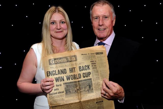 Nancy Fielder with Sir Geoff Hurst and the Green 'Un newspaper in 1966 after the World Cup at The Star Football Awards. Picture: Andrew Roe