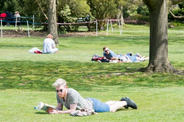 Students take time to chill out in Sheffield's Botanical Gardens as the temperature rose to 20 degrees
Picture Dean Atkins