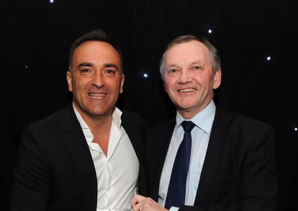 Carlos Carvalhal wins the Manager of the Year with Steve Radcliffe at The Star Football Awards. Picture: Andrew Roe
