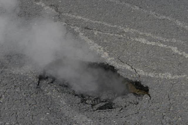 Pond Street mysterious steaming hole appeared in road