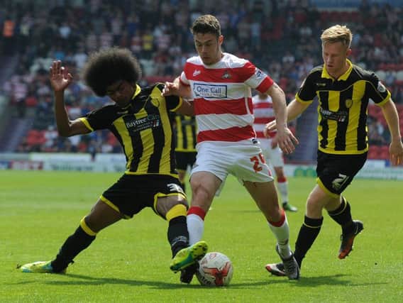 Tommy Rowe in action against Burton. Photo: Andrew Roe