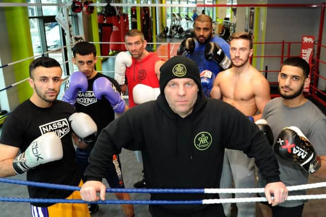Ryan Rhodes and his crew at his gym on London Road. Picture: Andrew Roe