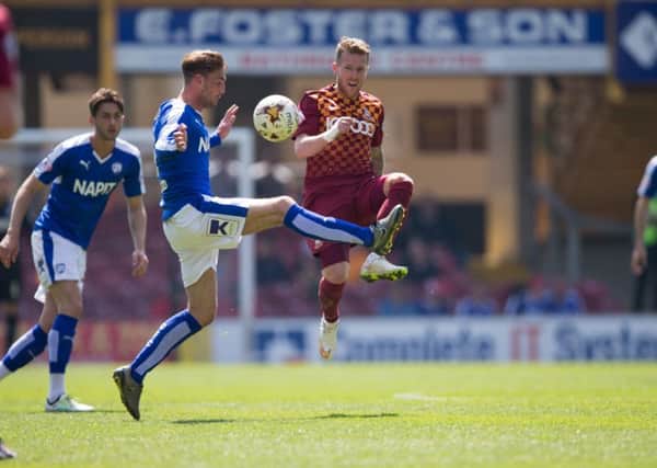 Bradford City vs Chesterfield - Gary Liddle battles for the ball  - Pic By James Williamson