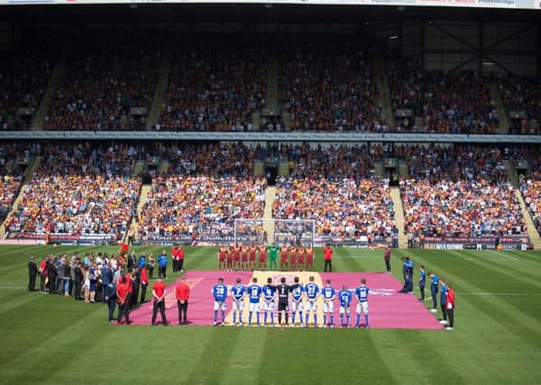 Bradford City vs Chesterfield - The Chesterfield and Bradford players observe a minutes silence for the victims of the Bradford Fire - Pic By James Williamson