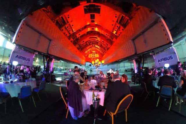 Diners sat under the open bomb bay doors of th Vulcan