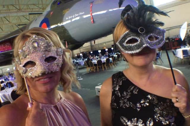 Masked fun at the charity ball