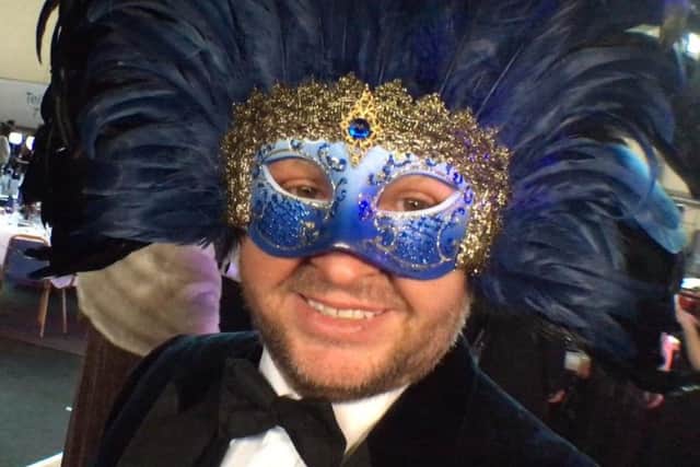 Feather in his cap - reveller at Vulcan Finningley Masquerade Ball