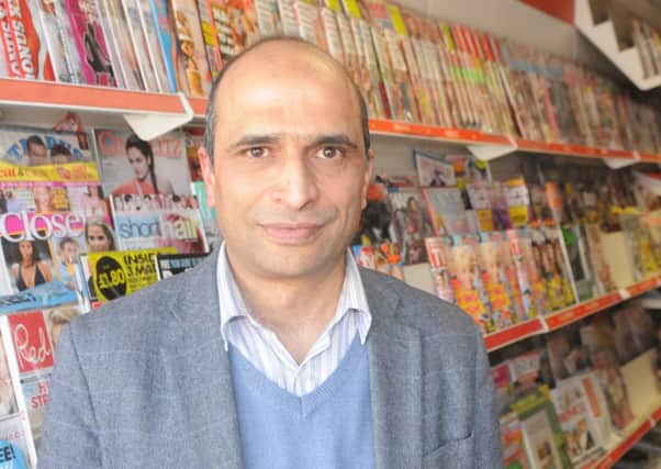 Sajjad Ahmed, 46, who runs National News in Wostenholm Road, Sharrow, Sheffield, fought off and detained a robber until the police arrived.