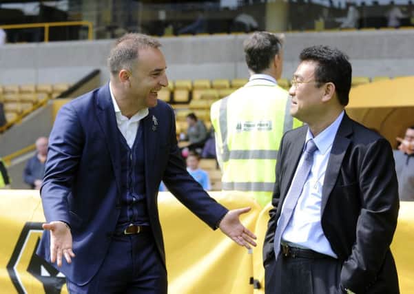 Carlos Carvalhal, left, and chairman Dejphon Chansiri